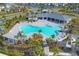 Aerial view of community pool with surrounding landscape at 10328 Charlotte Dr, Parrish, FL 34219