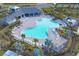 Resort-style community pool with plenty of lounge chairs at 10328 Charlotte Dr, Parrish, FL 34219