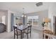 Casual dining area with table and chairs, near sliding door to patio at 10328 Charlotte Dr, Parrish, FL 34219