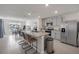 Modern kitchen with stainless steel appliances and an island at 10328 Charlotte Dr, Parrish, FL 34219