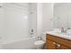 Simple bathroom with a shower/tub combo and wood vanity at 10531 Piedra Dr, Palmetto, FL 34221