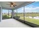 Relaxing screened patio overlooking a pond at 10531 Piedra Dr, Palmetto, FL 34221