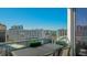 Balcony with city and water views, table and chairs at 111 S Pineapple Ave # 1006, Sarasota, FL 34236