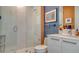 Stylish bathroom with a glass-enclosed shower at 111 S Pineapple Ave # 1006, Sarasota, FL 34236