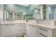 Elegant bathroom with dual sinks and modern design at 111 S Pineapple Ave # 1006, Sarasota, FL 34236