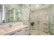 Modern bathroom with a walk-in shower and updated fixtures at 111 S Pineapple Ave # 1006, Sarasota, FL 34236