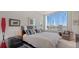 Bright bedroom with large windows and city views at 111 S Pineapple Ave # 1006, Sarasota, FL 34236