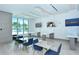 Common area with tables, chairs, and city views at 111 S Pineapple Ave # 1006, Sarasota, FL 34236