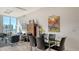 Modern condo dining area, glass table with seating for six at 111 S Pineapple Ave # 1006, Sarasota, FL 34236