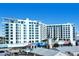 Modern highrise building with artistic facade and city views at 111 S Pineapple Ave # 1006, Sarasota, FL 34236