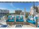 Rooftop lounge with comfortable seating and city views at 111 S Pineapple Ave # 1006, Sarasota, FL 34236