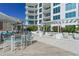 Outdoor patio with seating and grilling station at 111 S Pineapple Ave # 1006, Sarasota, FL 34236