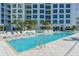 Resort-style pool with plenty of lounge chairs at 111 S Pineapple Ave # 1006, Sarasota, FL 34236