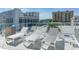 Rooftop deck with lounge chairs and city views at 111 S Pineapple Ave # 1006, Sarasota, FL 34236