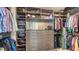 Large walk-in closet with ample shelving and hanging space at 111 S Pineapple Ave # 1006, Sarasota, FL 34236