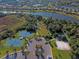 Aerial view of community tennis courts and dog park at 12654 Harney St, Venice, FL 34293