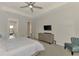 Main bedroom with ensuite bathroom and walk-in closet at 12654 Harney St, Venice, FL 34293