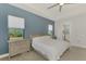 Main bedroom with ensuite bathroom and walk-in closet at 12654 Harney St, Venice, FL 34293