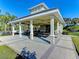 Covered picnic pavilion with tables and seating at 12654 Harney St, Venice, FL 34293