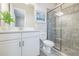 Modern bathroom with single vanity, toilet and a glass shower at 12826 Sorrento Way, Bradenton, FL 34211