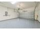 Spacious garage with automatic door opener and epoxy floor at 12826 Sorrento Way, Bradenton, FL 34211