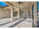 Covered patio with tile flooring and ceiling fans at 12826 Sorrento Way, Bradenton, FL 34211