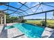 Screened pool and spa with a view of a lake and golf course at 12826 Sorrento Way, Bradenton, FL 34211