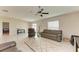 Relaxing living room with tiled floors and neutral decor at 13262 Jeter Creek Dr, Riverview, FL 33579