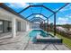 Relaxing pool and spa with water view at 13377 Alocasia Ln, Port Charlotte, FL 33981