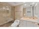 Bathroom features a vanity with a large mirror, toilet and shower/tub combo at 1465 Gulf Of Mexico Dr # 402, Longboat Key, FL 34228