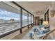 Enjoy breathtaking water views from this enclosed balcony with seating at 1465 Gulf Of Mexico Dr # 402, Longboat Key, FL 34228