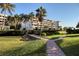 Brick walkway leading to the community building at 1465 Gulf Of Mexico Dr # 402, Longboat Key, FL 34228