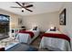 Bedroom with two twin beds and private balcony at 1479 Landings Cir # 41, Sarasota, FL 34231