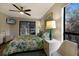 Main bedroom with a king bed and access to a balcony at 1479 Landings Cir # 41, Sarasota, FL 34231