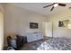 Bright bedroom with dresser and access to bathroom at 1479 Landings Cir # 41, Sarasota, FL 34231