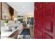 Bright entryway with hardwood floors and modern console table at 1479 Landings Cir # 41, Sarasota, FL 34231