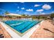 Refreshing community pool with a large sundeck area at 1479 Landings Cir # 41, Sarasota, FL 34231