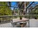 Dining area on a screened deck at 1479 Landings Cir # 41, Sarasota, FL 34231