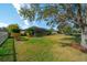 Large backyard with pool and lush landscaping at 14901 17Th E Ave, Bradenton, FL 34212