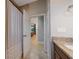 Bathroom with shower and view into another room at 14901 17Th E Ave, Bradenton, FL 34212