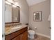 Small bathroom with granite countertop and toilet at 14901 17Th E Ave, Bradenton, FL 34212