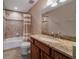 Bathroom with tub, toilet, and granite countertop at 14901 17Th E Ave, Bradenton, FL 34212