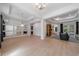 Bright dining room with hardwood floors, chandelier and views to the living room at 14901 17Th E Ave, Bradenton, FL 34212