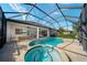 Relaxing pool and spa with screened enclosure at 14901 17Th E Ave, Bradenton, FL 34212