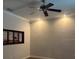 Bedroom with ceiling fan and window with shutters at 15986 Cutting Horse Trl, Myakka City, FL 34251