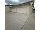 Three-car garage with ample space for parking at 15986 Cutting Horse Trl, Myakka City, FL 34251