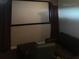 Dedicated home theater with projector and seating at 15986 Cutting Horse Trl, Myakka City, FL 34251