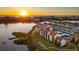 Aerial view of waterfront community at sunset at 1602 Stickney Point Rd # 1602-301, Sarasota, FL 34231