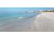 Expansive beach with clear water and city view at 1602 Stickney Point Rd # 1602-301, Sarasota, FL 34231