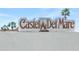 Castel Del Mare community entrance sign at 1602 Stickney Point Rd # 1602-301, Sarasota, FL 34231